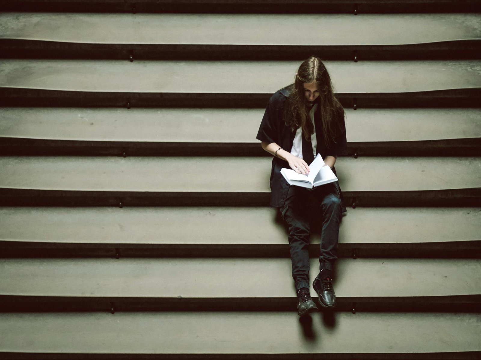 man reading and learning english
