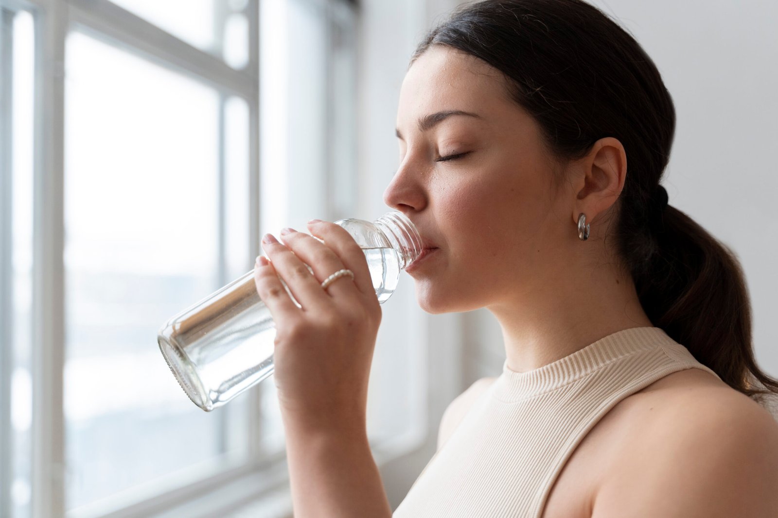 woman drinking water is hydration